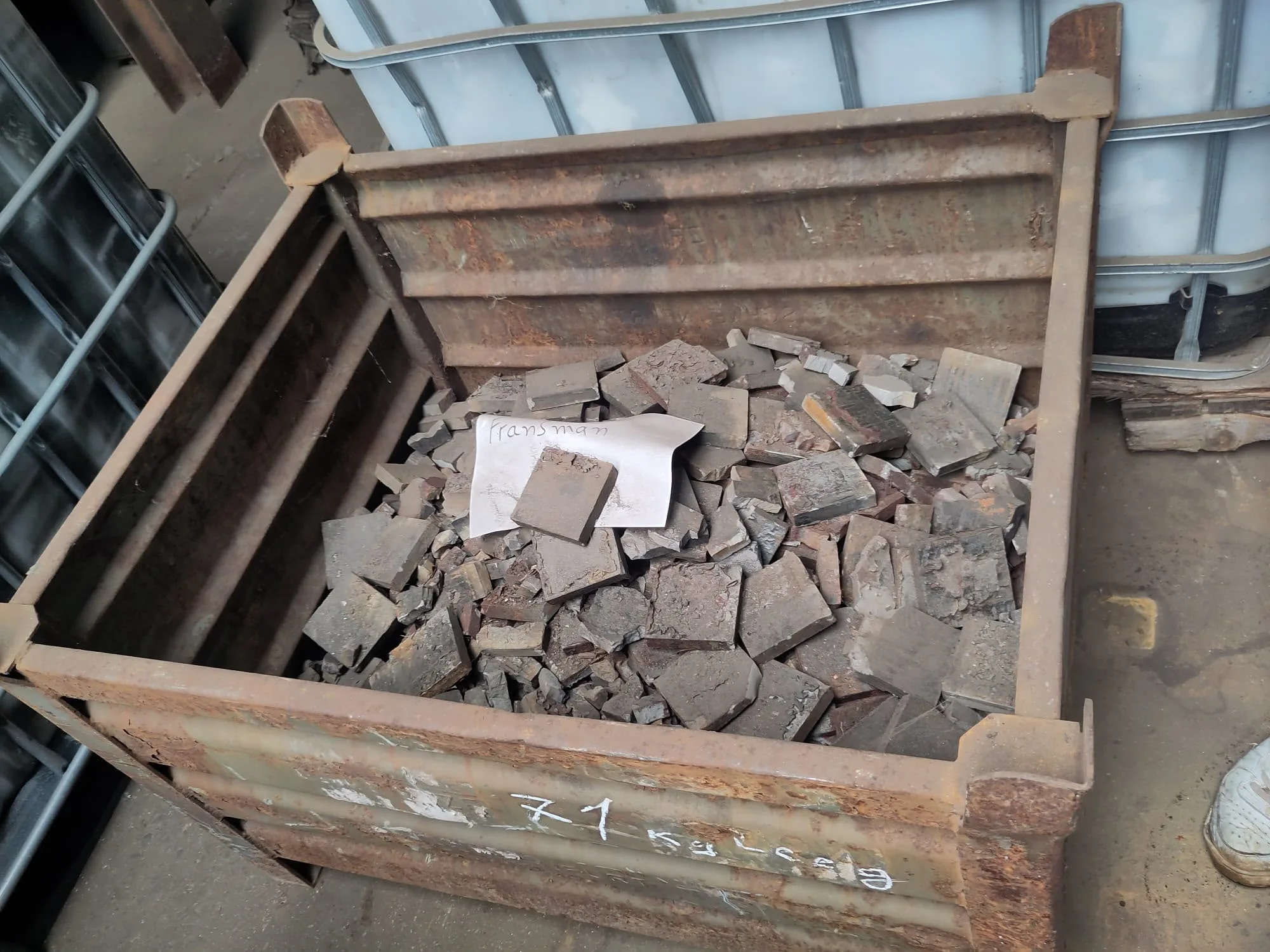 Steel crate filled with end-of-life magnet material for recycling
